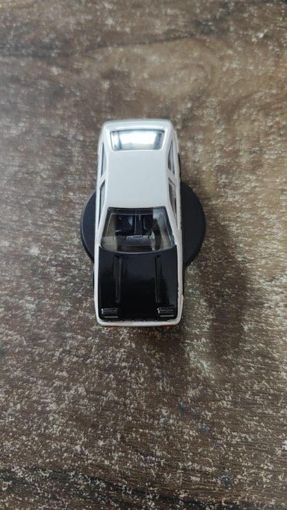 Mini Car Model with Self-Adhesive Base – Dashboard Decoration Toy (1 Pc)